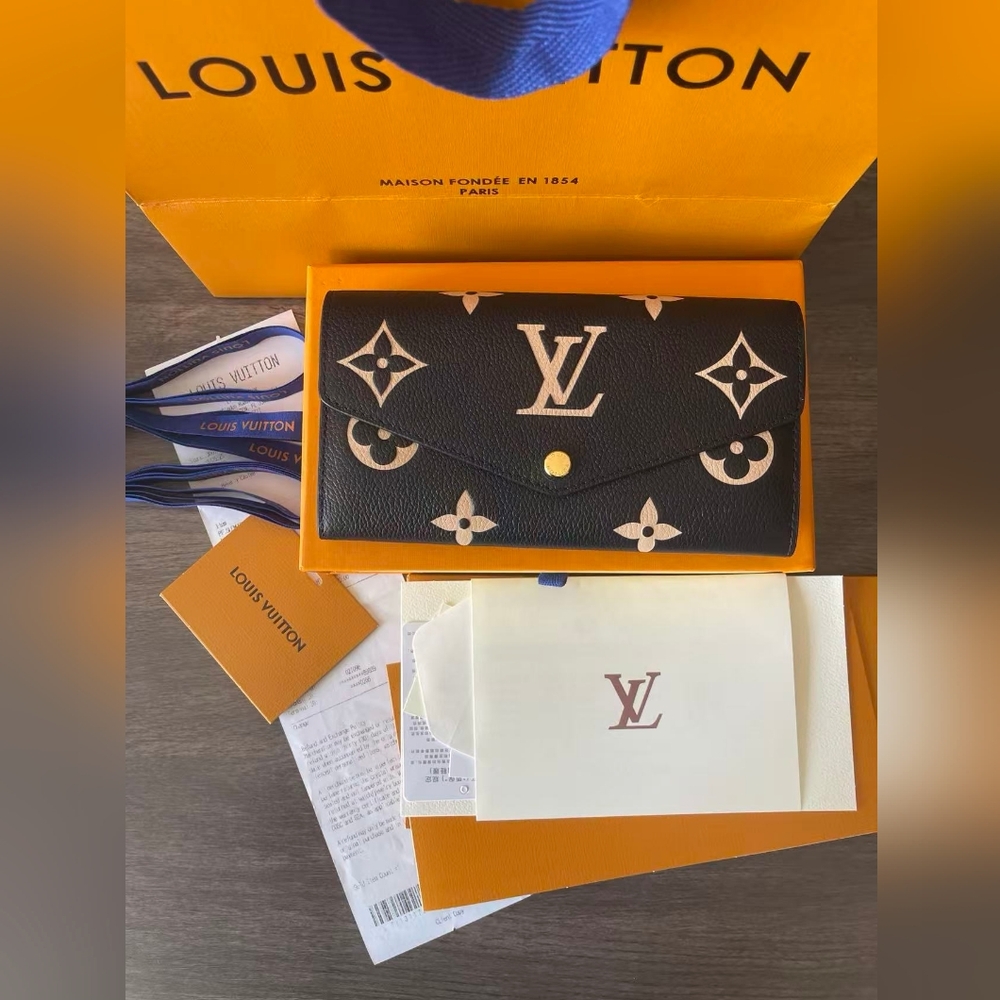 LOUIS VUITTON Monogram Empreinte Leather Sarah Wallet